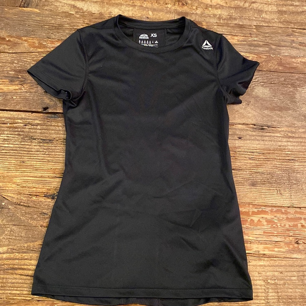 Reebok woman’s speedwick athletic top